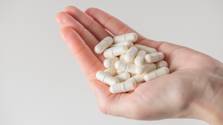 hands holding antibiotics 
